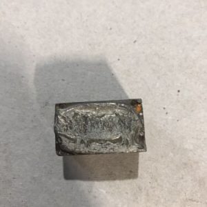 Vintage Metal Pig On Wooden Printer Block